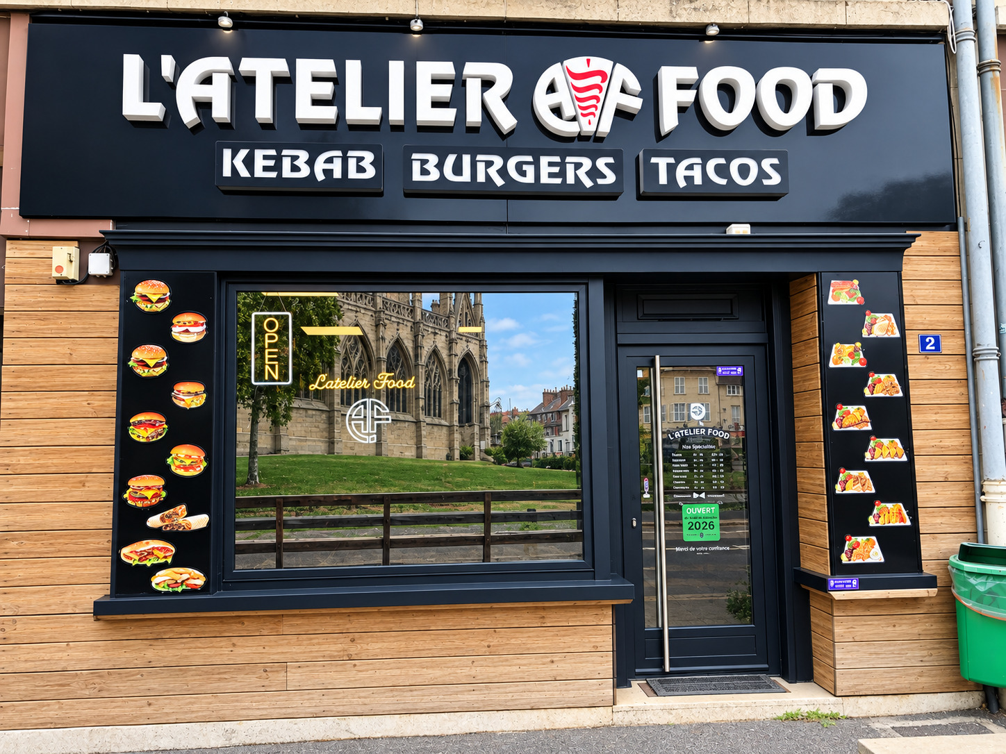 La façade de L'Atelier Food, enseigne « Kebab Burgers Tacos », vitrine et affiches de plats